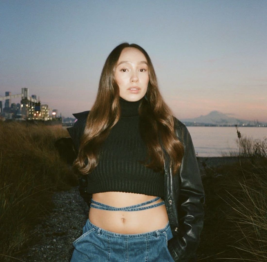 Long brunette waves at sunset